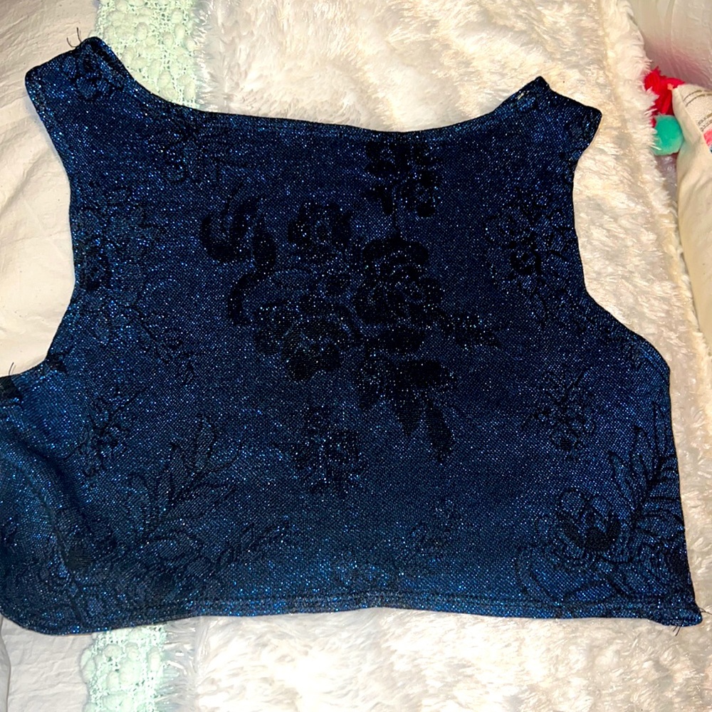 Vintage blue sparkly tank top. In great condition.